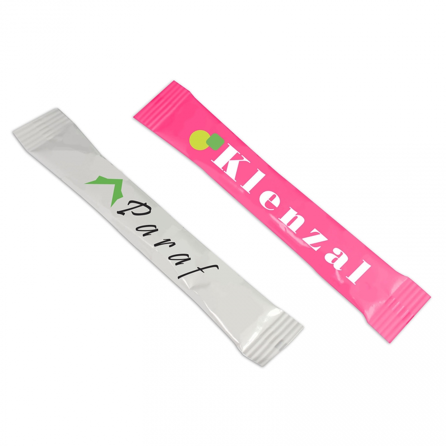 Un palito de azúcar, con aproximadamente 4 gramos de azúcar, envuelto en papel de aluminio blanco e impreso en color completo por todas partes - Brancaster - La Puebla de Albortón